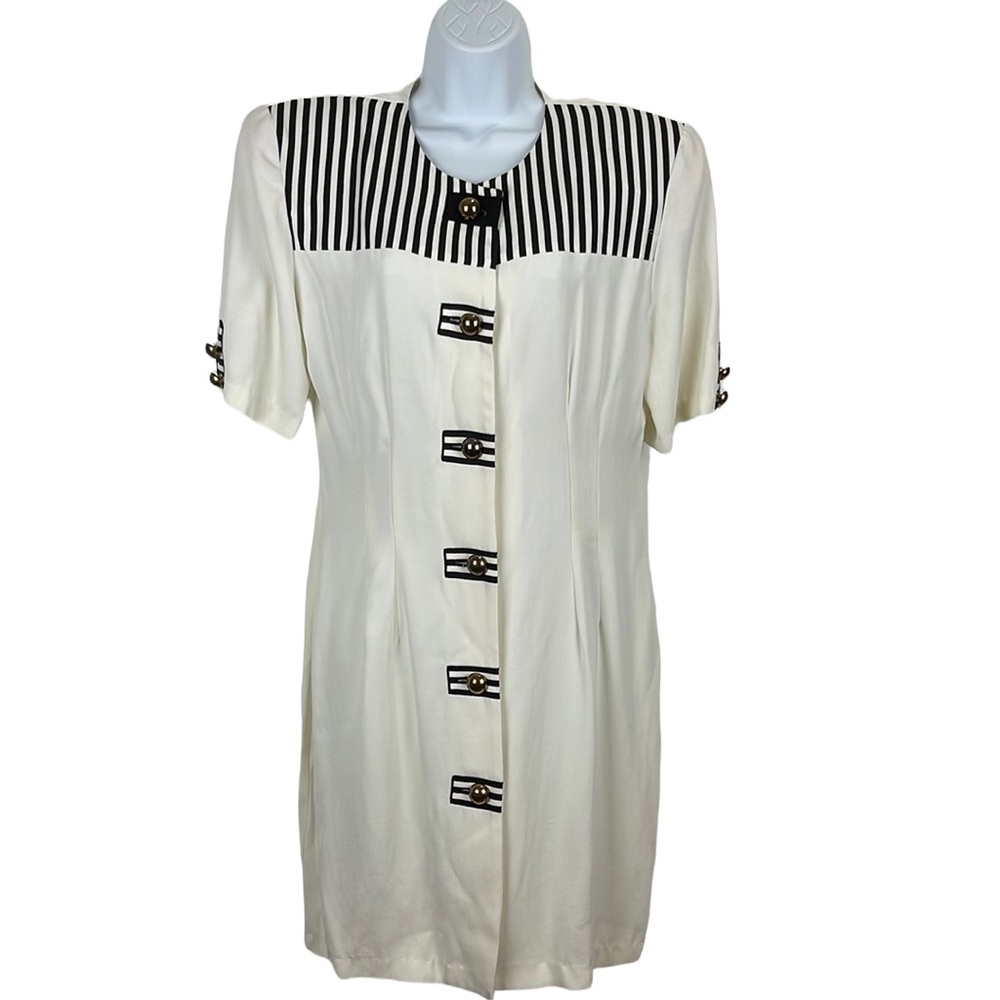 80’s power dress with black and white striped details